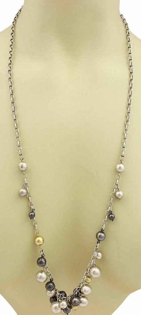 32 Inch Gurhan Cluster Necklace Sterling Silver With 24k Gold Beads: 32 Inch Gurhan Cluster Necklace Sterling Silver With 24k Gold Beads This authentic Gurhan necklace showcases a blend of white and darkened sterling silver, accented with 24k layered gold. The 32-inch