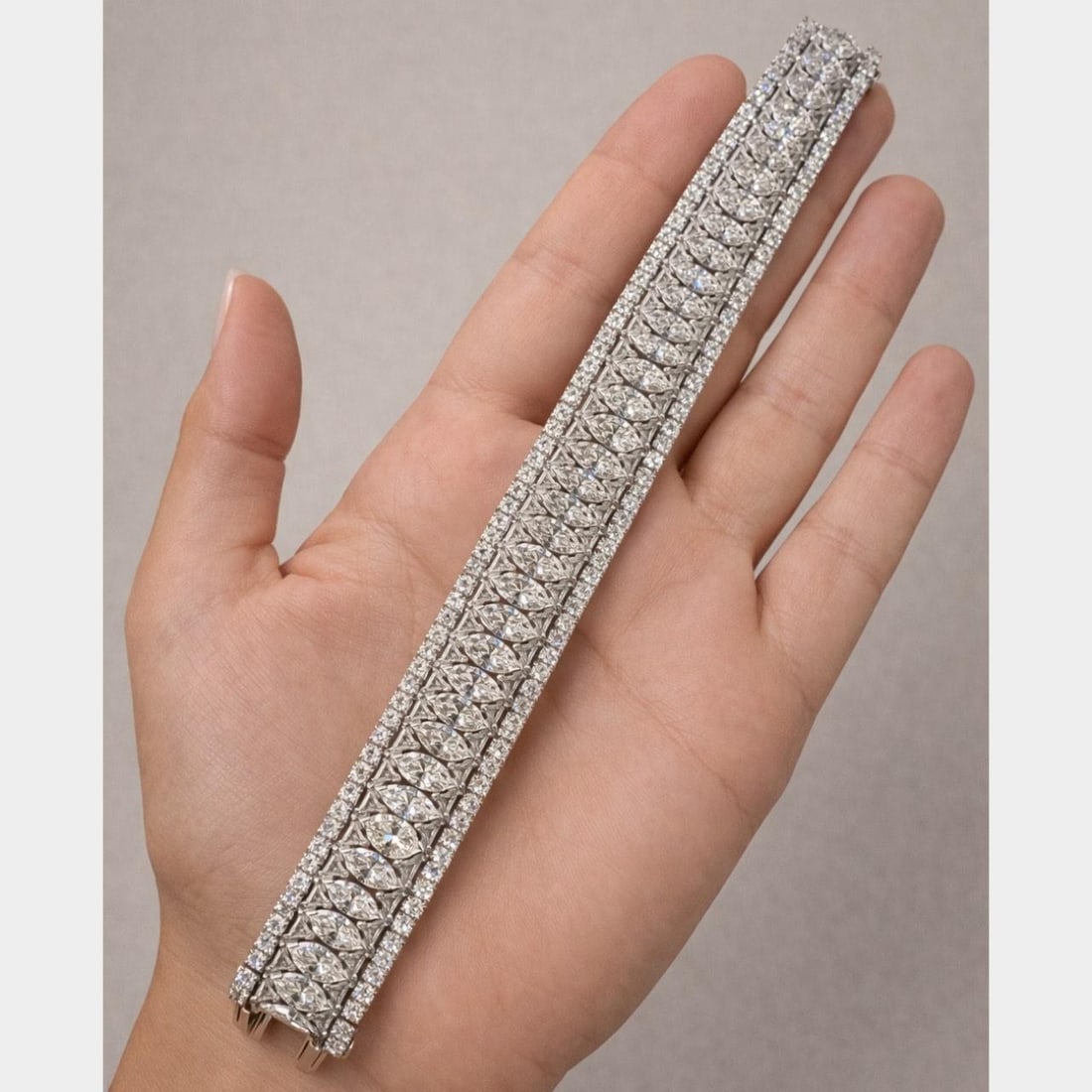 42.80 Carat Diamond Platinum Art Deco Bracelet with Marquise Trillion Round Stones: 42.80 Carat Diamond Platinum Art Deco Bracelet with Marquise Trillion Round Stones This Art Deco platinum bracelet is set with a total of 42.80 carats of diamonds. The piece features 40 marquise diamo