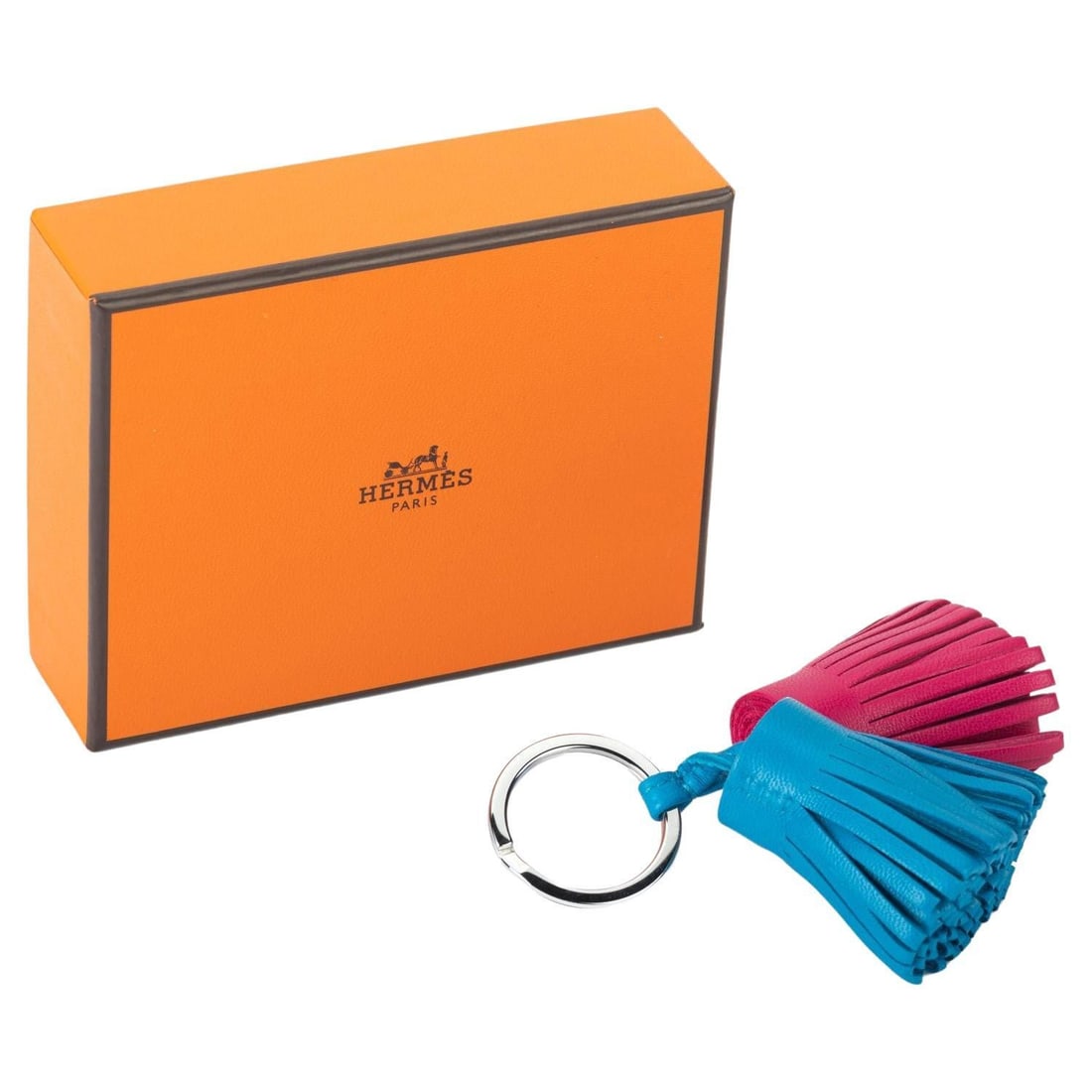 Hermes Double Carmen Bag Charm Keychain BNIB France: Hermes Double Carmen Bag Charm Keychain BNIB France This Hermes Double Carmen Bag Charm is a chic accessory that elevates any handbag. Crafted from high-quality materials, this charm can also serve as