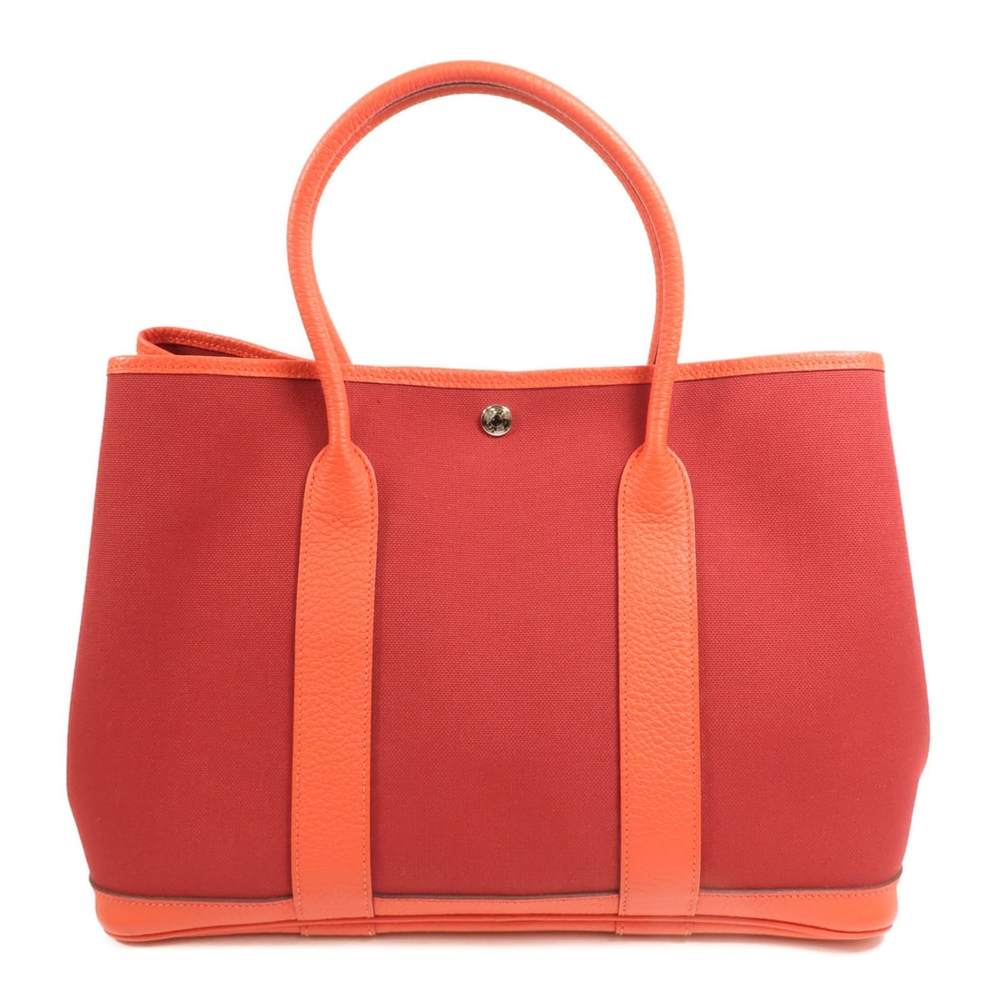 Hermes Garden Party PM Rouge Tomato Canvas Tote with Palladium Hardware: Hermes Garden Party PM Rouge Tomato Canvas Tote with Palladium Hardware This Hermes Garden Party PM tote bag features a canvas exterior in a striking red hue known as Rouge Tomato/Capucin. Made in Fra
