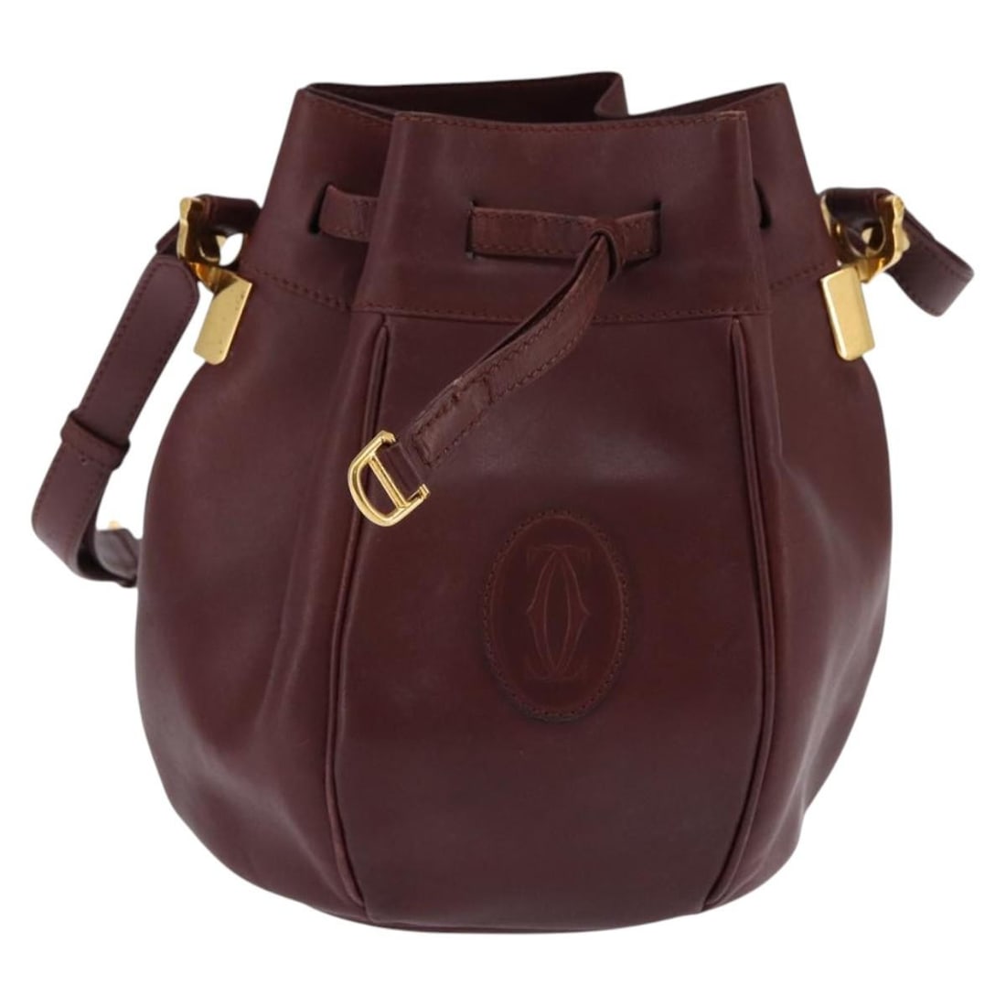 Burgundy Leather Must de Cartier Shoulder Bag 16cm x 23cm x 15cm: Burgundy Leather Must de Cartier Shoulder Bag 16cm x 23cm x 15cm The Cartier Must de Cartier bag is crafted from leather in a rich burgundy color. Designed for women, this pre-owned bag features a str