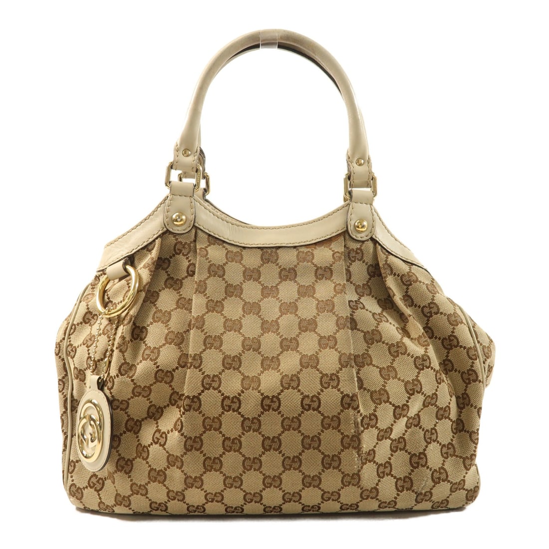 Gucci GG Brown Beige Canvas Shoulder Bag with Gold Hardware: Gucci GG Brown Beige Canvas Shoulder Bag with Gold Hardware This Gucci shoulder bag features the iconic GG canvas in brown and beige tones. Made in Italy, it offers a spacious design with reasonable w