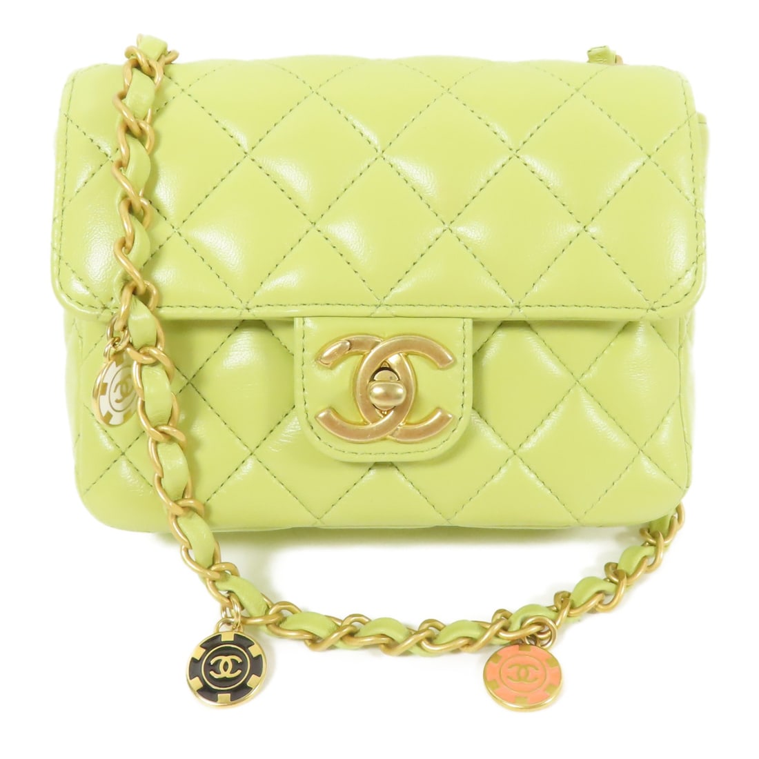 CHANEL Mini Flap Shoulder Bag Yellow Lambskin with CC Charms and Gold Chain: CHANEL Mini Flap Shoulder Bag Yellow Lambskin with CC Charms and Gold Chain This Chanel Mini Flap Shoulder Bag features a yellow lambskin leather exterior with CC charms and a chain strap. Made in Fra