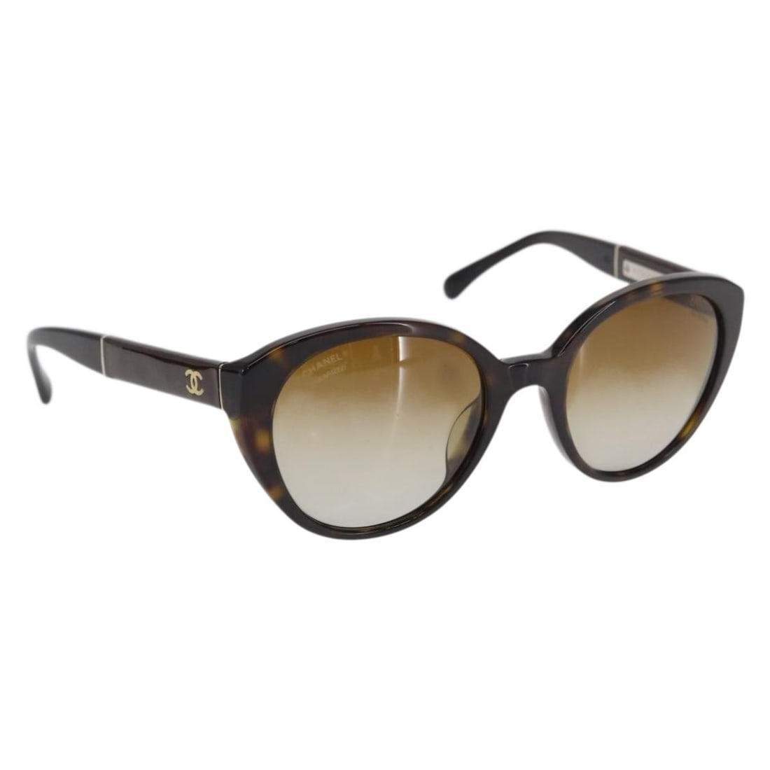 Brown Plastic CHANEL CC Sunglasses with Case Italy: Brown Plastic CHANEL CC Sunglasses with Case Italy These CHANEL sunglasses feature a stylish brown plastic frame and are crafted in Italy. The sunglasses show reasonable wear and tear, including sligh