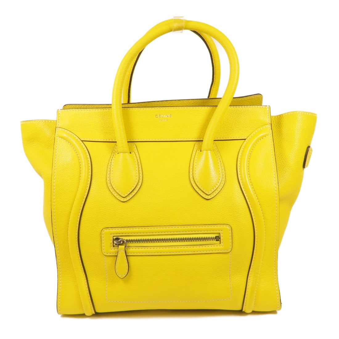 CELINE Mini Luggage Handbag Yellow Calfskin Leather SHW: CELINE Mini Luggage Handbag Yellow Calfskin Leather SHW This CELINE Mini Luggage Handbag is crafted from high-quality calfskin leather, showcasing a vibrant yellow exterior that exudes style and sophi