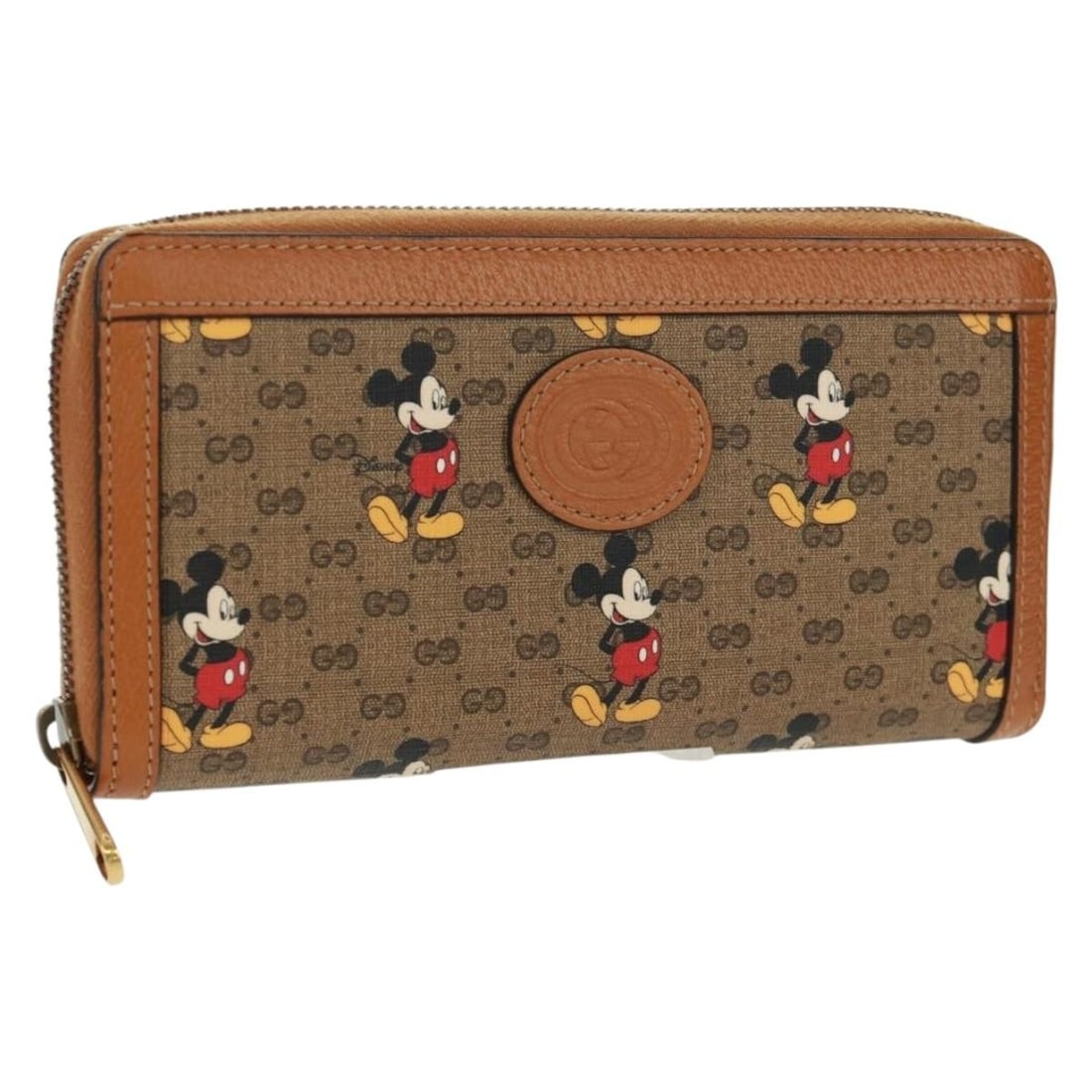 Disney Collaboration Beige Micro GG Canvas Long Wallet by Gucci: Disney Collaboration Beige Micro GG Canvas Long Wallet by Gucci This is a GUCCI Micro GG Supreme Disney Collaboration long wallet crafted from Micro Small GG canvas in beige. The wallet features a sli