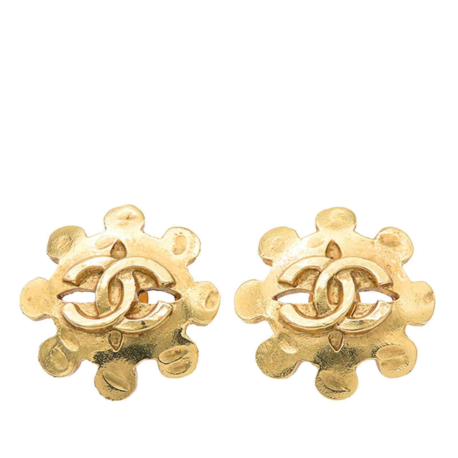 Chanel Flower Motif Gold Plated Clip On Earrings: Chanel Flower Motif Gold Plated Clip On Earrings These Chanel CC gold-plated flower clip-on earrings feature a gold-plated metal construction with a flower motif and secure clip-on closures. Made in F