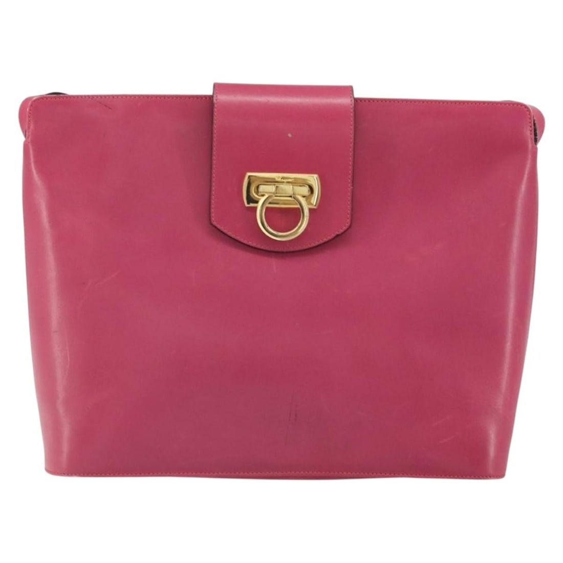 Pink Gancini Leather Shoulder Purse by Salvatore Ferragamo: Pink Gancini Leather Shoulder Purse by Salvatore Ferragamo This Salvatore Ferragamo Gancini Shoulder Bag is crafted from pink leather and designed for women. Made in Italy, it features the signature G