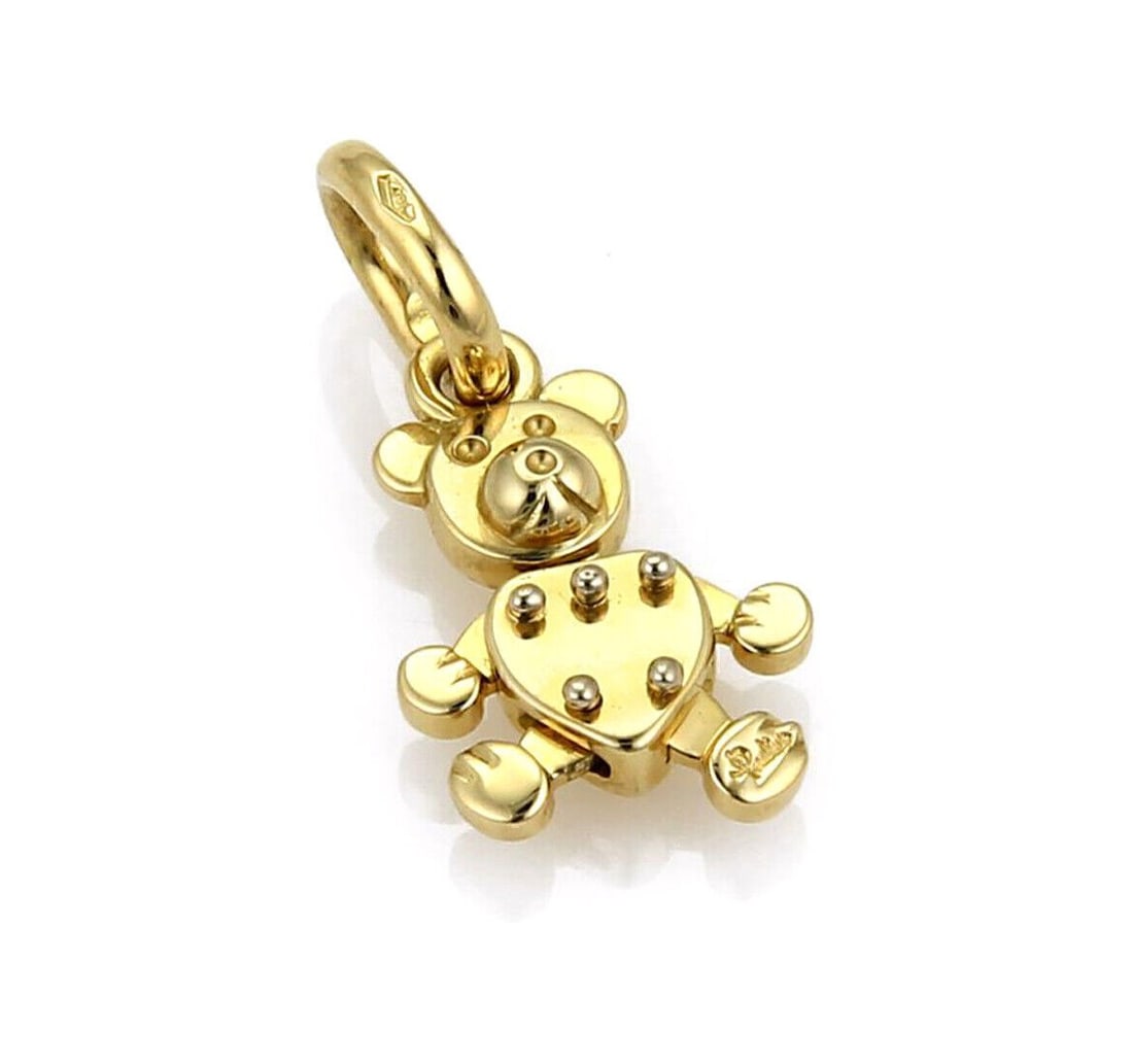 18k Yellow Gold Bear Pendant Pomellato Mini Puppet Charm: 18k Yellow Gold Bear Pendant Pomellato Mini Puppet Charm This Pomellato Mini Puppet Animated Bear Charm Pendant is crafted from 18k yellow gold and features a charming bear design. The pendant is sign