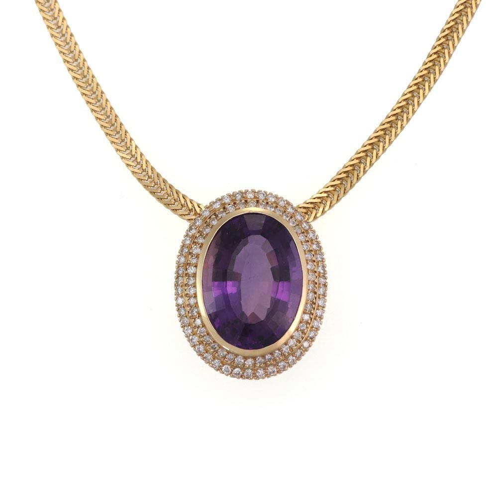 Estate 21.40ct Amethyst Diamond 14k Gold Slide Pendant with Chain: Estate 21.40ct Amethyst Diamond 14k Gold Slide Pendant with Chain This stunning estate pendant and chain are beautifully crafted from 14k yellow gold. The piece features a large oval slide pendant set