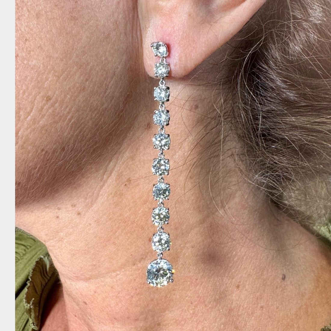Elegant French 18K White Gold 12.40 Ct Diamond Earrings: Elegant French 18K White Gold 12.40 Ct Diamond Earrings These exquisite French earrings are crafted from 18K white gold and feature a stunning total diamond weight of 12.40 ct. The earrings are adorne