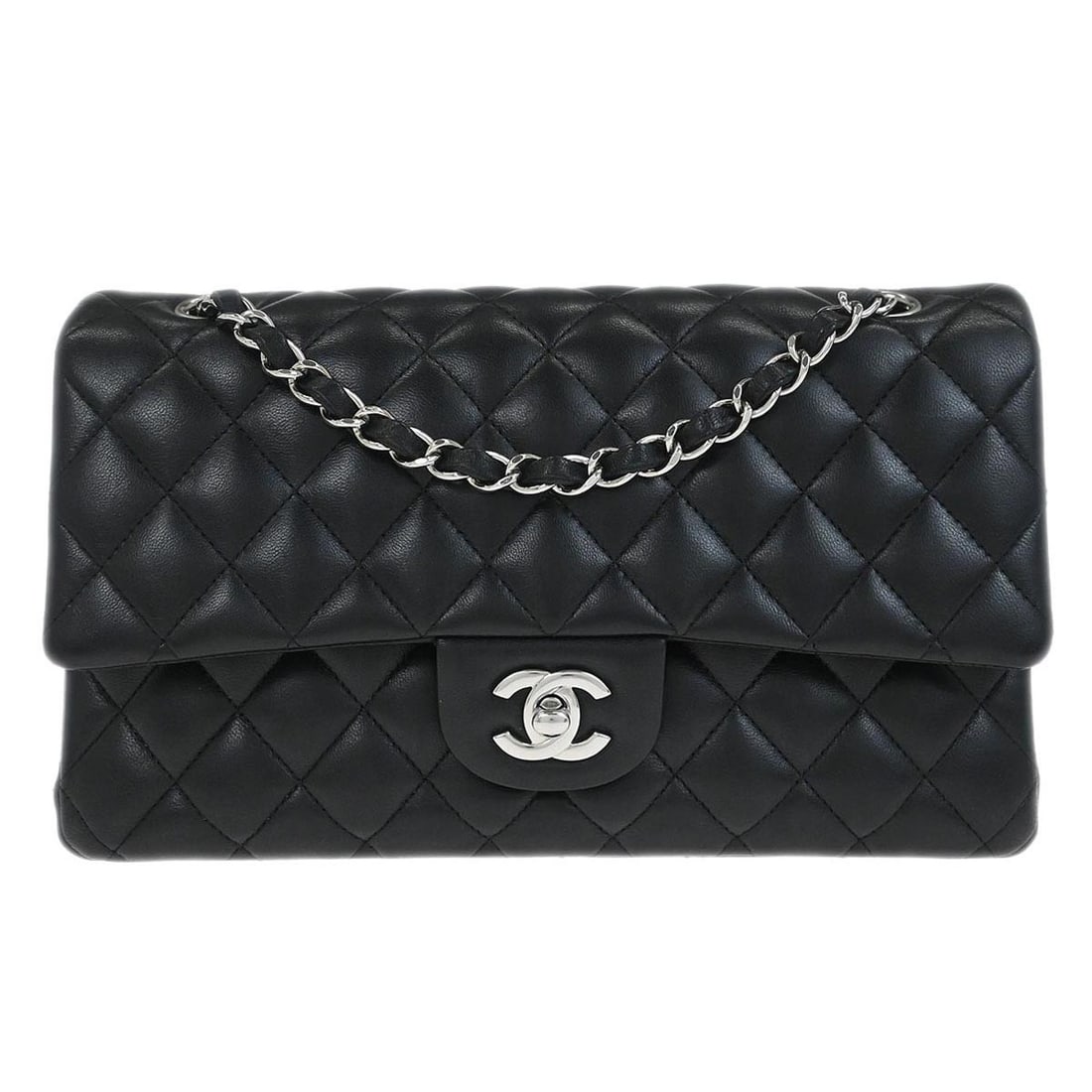 Medium Classic Double Flap Shoulder Bag in Black Lambskin by Chanel: Medium Classic Double Flap Shoulder Bag in Black Lambskin by Chanel This Chanel Classic Double Flap shoulder bag is crafted from black lambskin leather and features a medium size with the iconic turn
