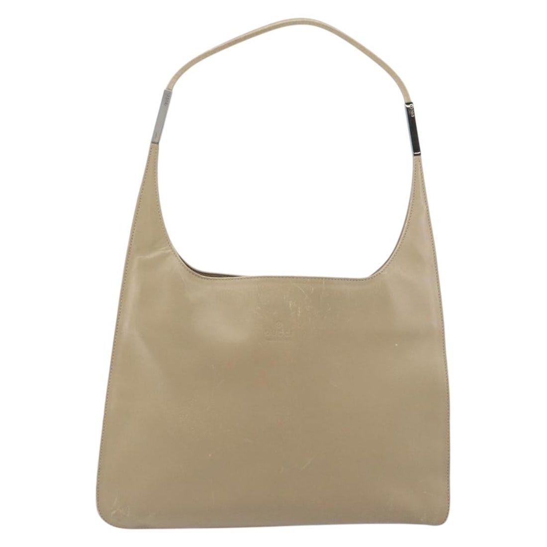 Beige Leather Vintage Gucci Shoulder Bag for Women: Beige Leather Vintage Gucci Shoulder Bag for Women This Gucci vintage shoulder bag features beige leather construction and is designed for women. The bag shows signs of previous use, including surface