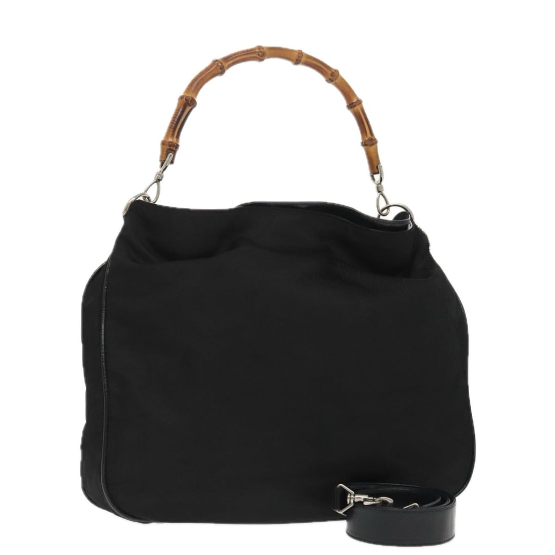 Gucci Nylon Black Shoulder Bag Vintage Bamboo Design: Gucci Nylon Black Shoulder Bag Vintage Bamboo Design This Gucci Vintage Bamboo Shoulder Bag for women features a black nylon body with bamboo handles. The bag shows signs of wear including surface sta