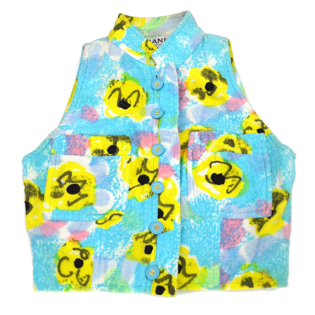 Vintage CHANEL Light Blue Flower Pattern Sleeveless Vest Jacket: Vintage CHANEL Light Blue Flower Pattern Sleeveless Vest Jacket Elevate your casual wardrobe with this vintage Chanel Flower Pattern Sleeveless Vest Jacket, crafted from 100% cotton in a refreshing li