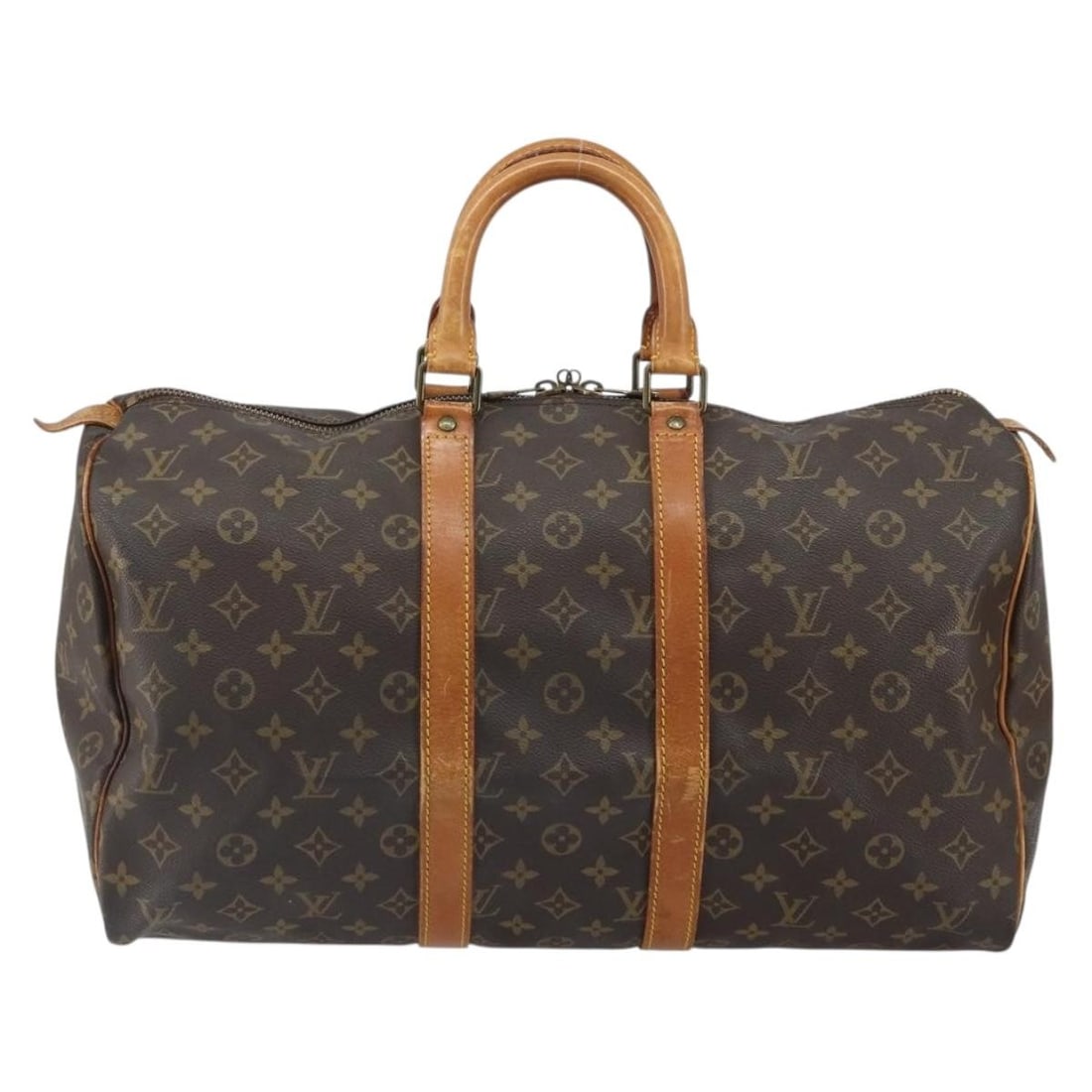 Louis Vuitton Monogram Canvas Keepall 45cm Travel Bag: Louis Vuitton Monogram Canvas Keepall 45cm Travel Bag Louis Vuitton Keepall Bag in monogram canvas designed for unisex use. This spacious travel bag features a brown canvas exterior with leather handl