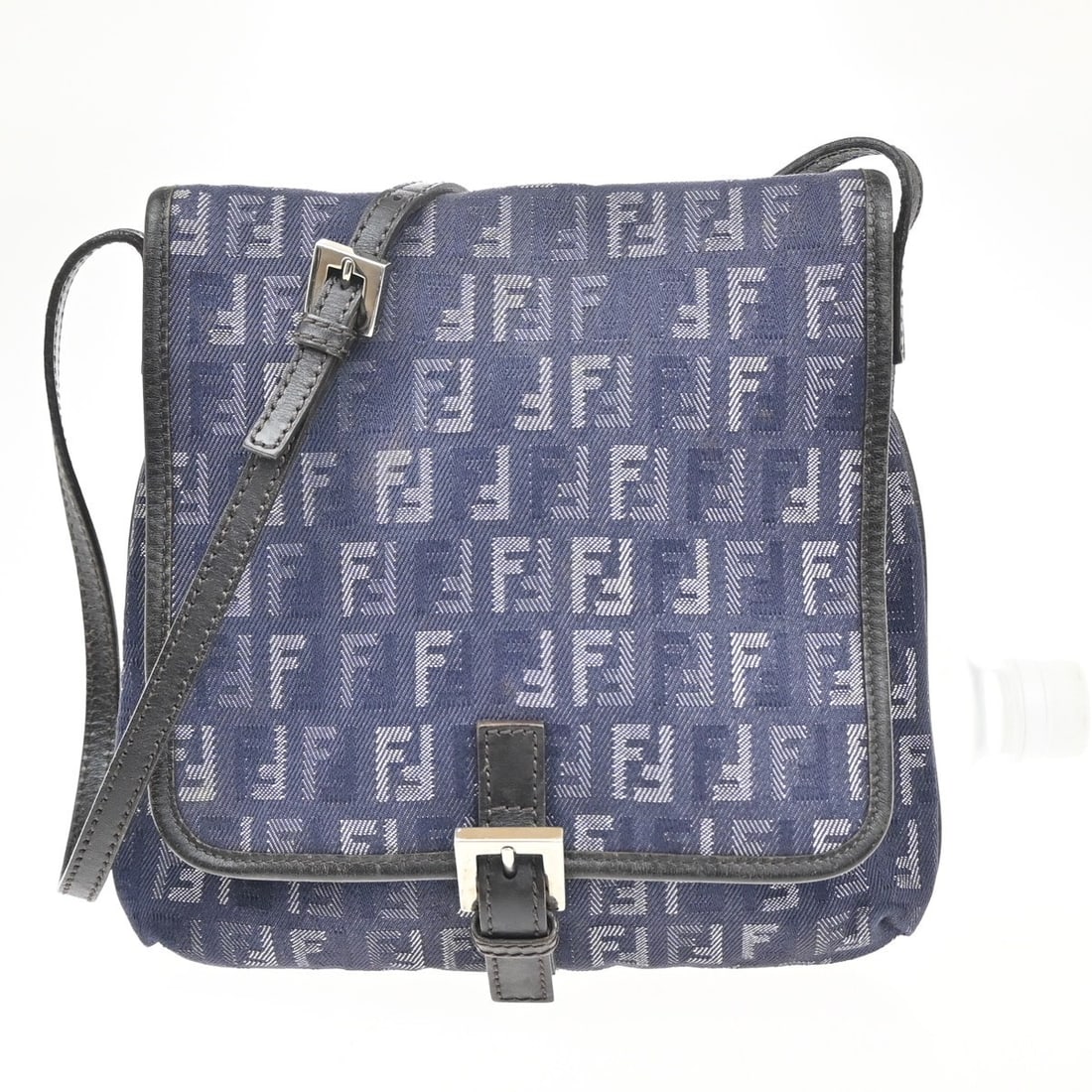 Vintage Fendi Denim Crossbody Flap Bag 23cm Italy: Vintage Fendi Denim Crossbody Flap Bag 23cm Italy This vintage Fendi flap crossbody bag for women features a blue denim jeans exterior with the iconic Zucchino pattern. It is crafted in Italy and desi