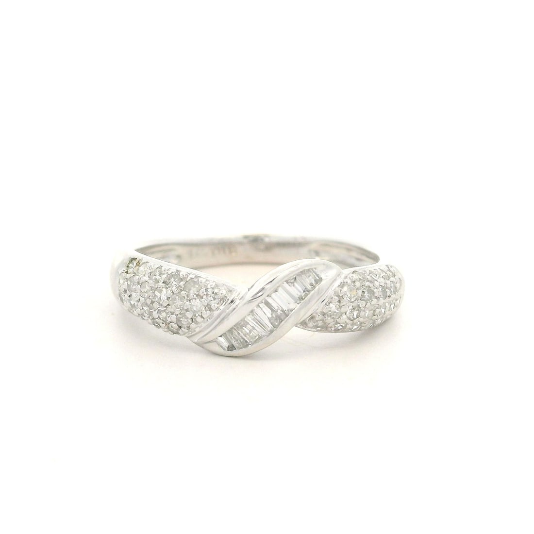 14k White Gold Twisted Wedding Band Ring with 0.60ctw Baguette Diamonds: 14k White Gold Twisted Wedding Band Ring with 0.60ctw Baguette Diamonds This stunning wedding band ring features a unique twisted center design crafted from 14k white gold. It showcases a total carat