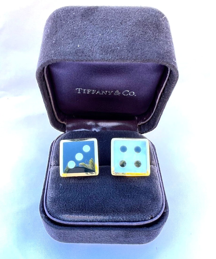 Tiffany & Co 18K Yellow Gold Onyx Mother of Pearl Earrings with Boxes: Tiffany & Co 18K Yellow Gold Onyx Mother of Pearl Earrings with Boxes Discover these exquisite Tiffany & Co. earrings, crafted from 18K yellow gold, featuring stunning onyx and mother of pearl accents