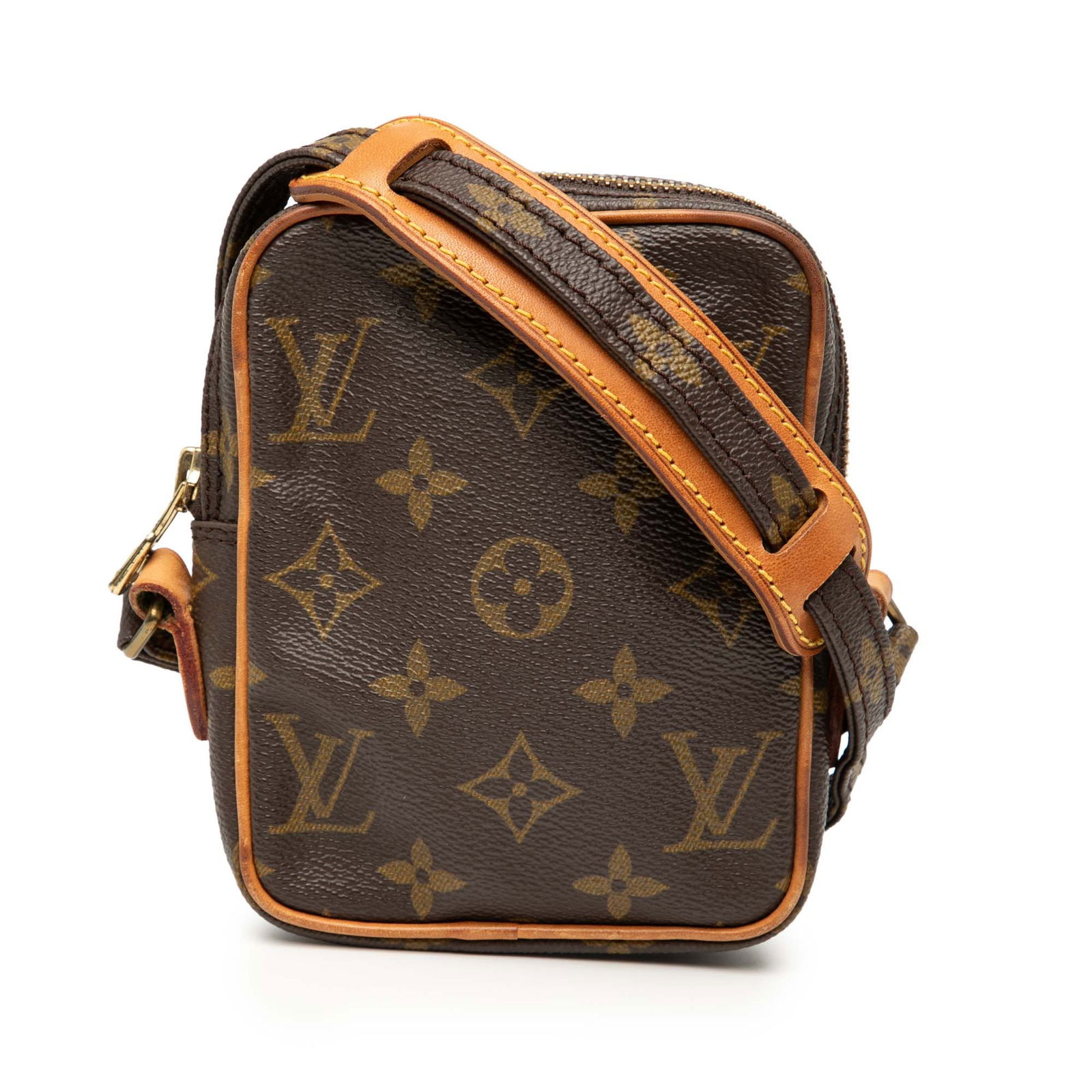 Louis Vuitton Monogram Mini Danube Bag with Vachetta Trim: Louis Vuitton Monogram Mini Danube Bag with Vachetta Trim The Louis Vuitton Monogram Mini Danube is a stylish and practical bag crafted from durable monogram canvas with vachetta leather trim. It feat
