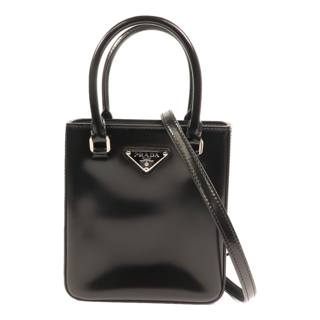 Prada Black Patent Leather 2-Way Small Shoulder Bag Model 1BA331 SHW: Prada Black Patent Leather 2-Way Small Shoulder Bag Model 1BA331 SHW This Prada small shoulder bag features a sleek black patent leather exterior and versatile 2-way design, allowing it to be worn as
