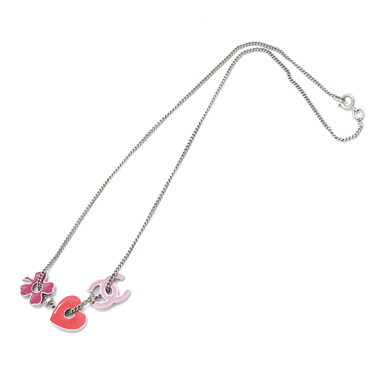 Chanel CC Heart Clover Silver Plated Charm Pendant Necklace: Chanel CC Heart Clover Silver Plated Charm Pendant Necklace Elevate your ensemble with this exquisite Chanel necklace featuring a striking silver plated design adorned with enamel heart and clover cha