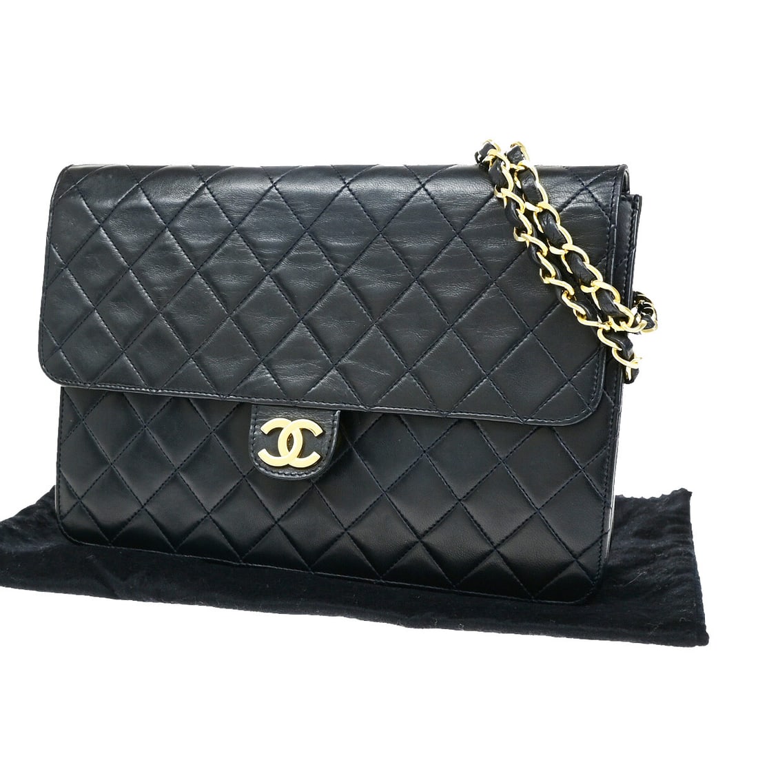 Navy Leather Quilted Shoulder Bag by Chanel Vintage Chain Flap: Navy Leather Quilted Shoulder Bag by Chanel Vintage Chain Flap This vintage Chanel chain flap bag features quilted navy leather crafted in France. Designed for women, it includes a shoulder chain and