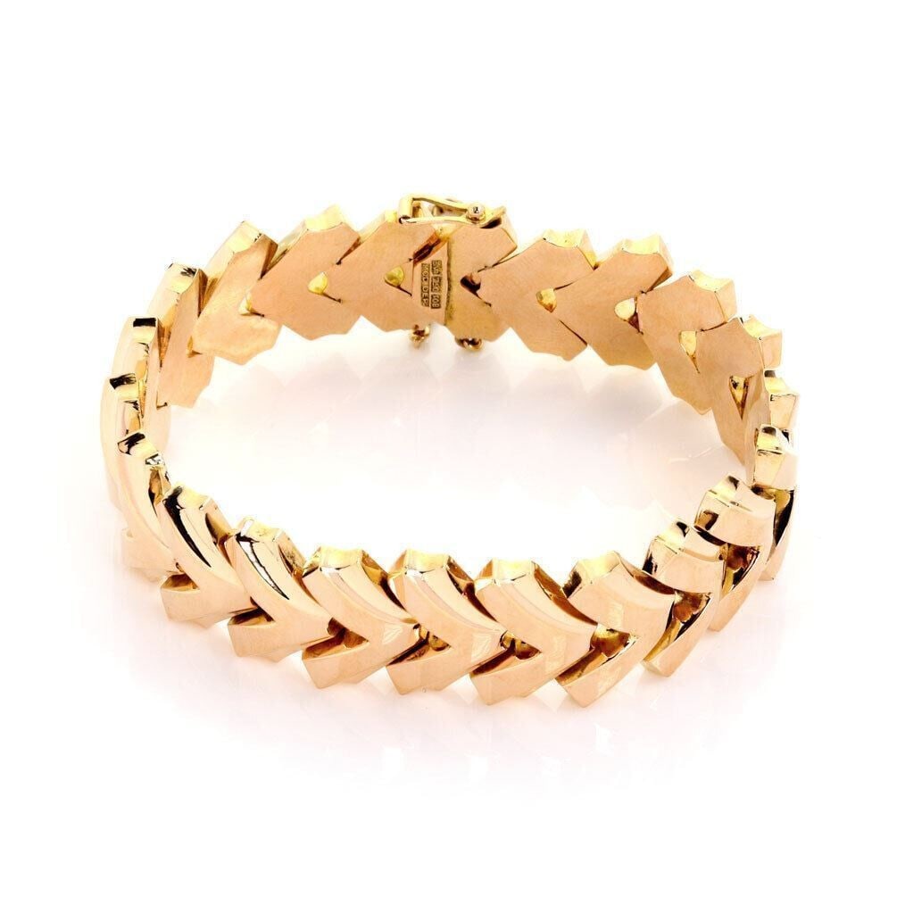 18k Rose Gold Wide Flexible Vintage Link Chain Bracelet: 18k Rose Gold Wide Flexible Vintage Link Chain Bracelet This retro wide flex bracelet features an intricate chain link design crafted from 18k rose gold. Its wide and flexible construction offers both