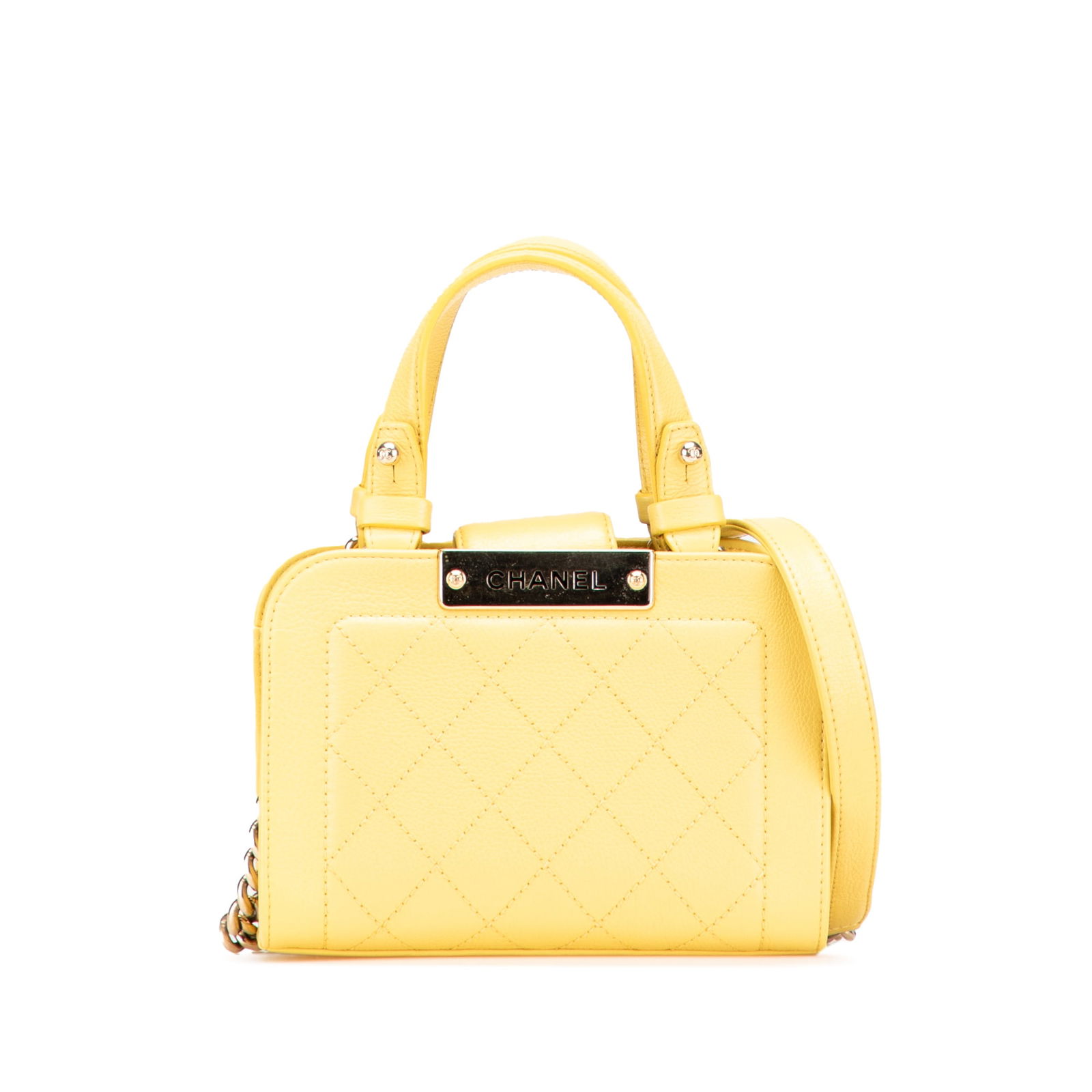 Chanel Yellow Quilted Calfskin Mini Label Click Tote: Chanel Yellow Quilted Calfskin Mini Label Click Tote This exquisite Chanel Mini Calfskin Label Click Shopping Tote is crafted from luxurious quilted calfskin leather in a vibrant yellow hue. It featur