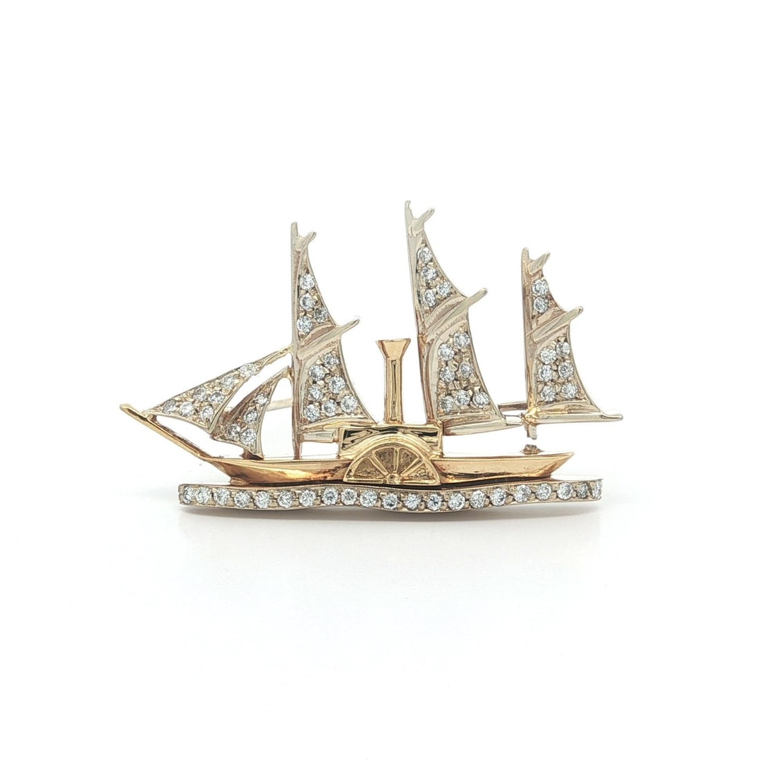 18k Yellow Gold Sailboat Brooch with 0.60ctw Diamonds Vintage Pin: 18k Yellow Gold Sailboat Brooch with 0.60ctw Diamonds Vintage Pin This vintage sailboat pin brooch is crafted in 18k yellow gold and features an intricate design accented by approximately 0.60 carats