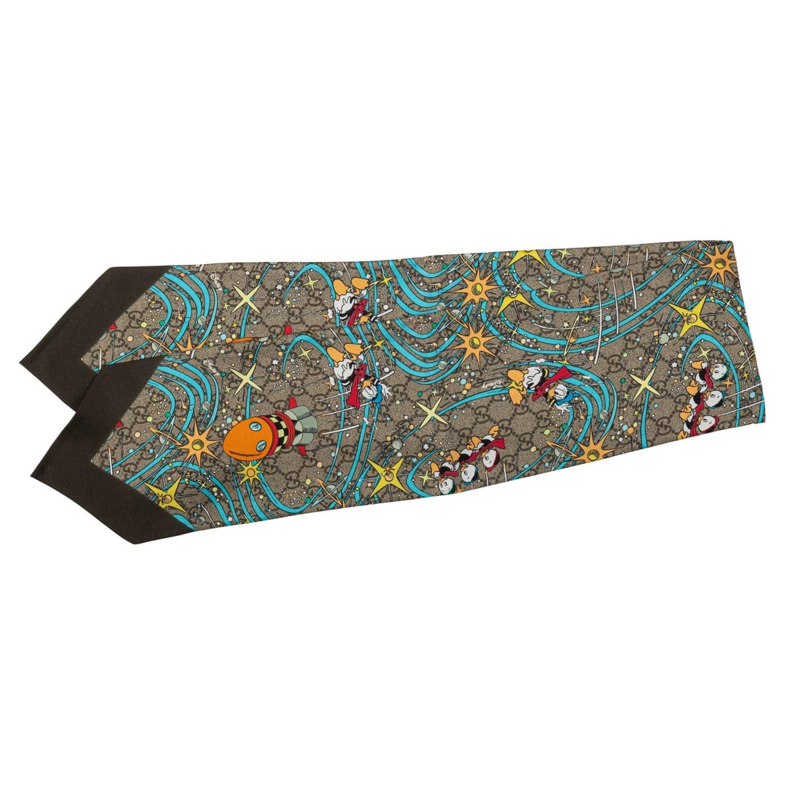 Gucci X Disney Donald Duck Silk Monogram Ascot Limited Edition: Gucci X Disney Donald Duck Silk Monogram Ascot Limited Edition Introducing the Gucci X Disney limited edition Donald Duck monogram ascot, crafted from 100% silk. This stylish accessory showcases a pla