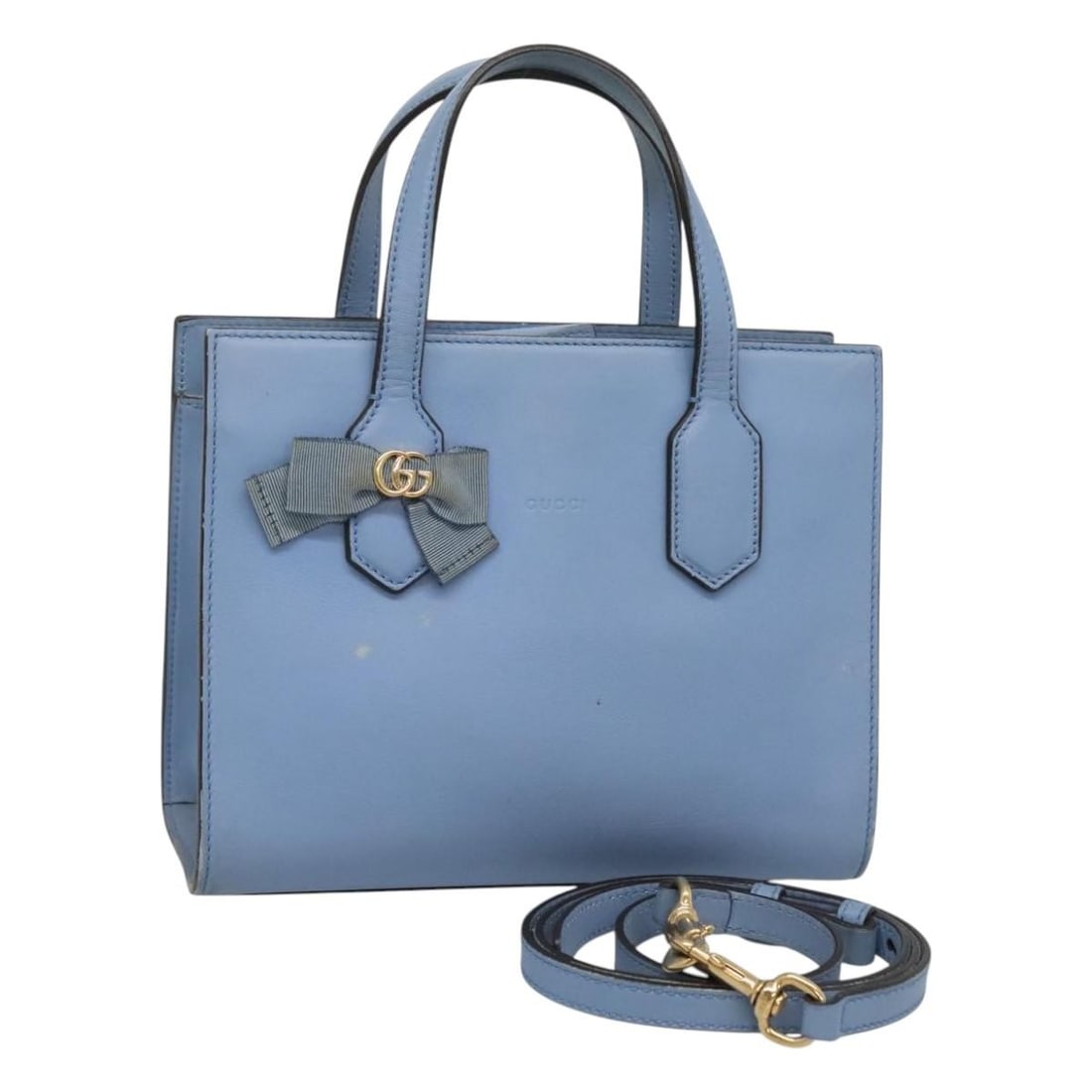 Blue Leather Tote Bag Gucci GG Ribbon 24cm x 16cm x 10cm: Blue Leather Tote Bag Gucci GG Ribbon 24cm x 16cm x 10cm This Gucci GG Ribbon Tote is crafted from blue leather with a signature GG ribbon detail, designed for female use. The tote measures 24cm x 16c