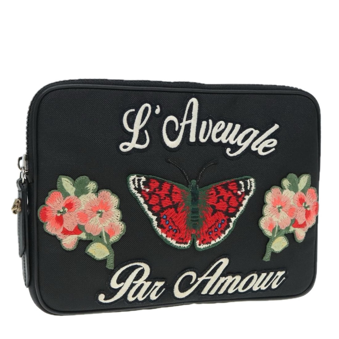 Gucci L'aveugle Par Amour Black Nylon Tablet Case: Gucci L'aveugle Par Amour Black Nylon Tablet Case This Gucci tablet case from the L'aveugle Par Amour collection is crafted from black nylon and designed for female users. It features metal fittings a