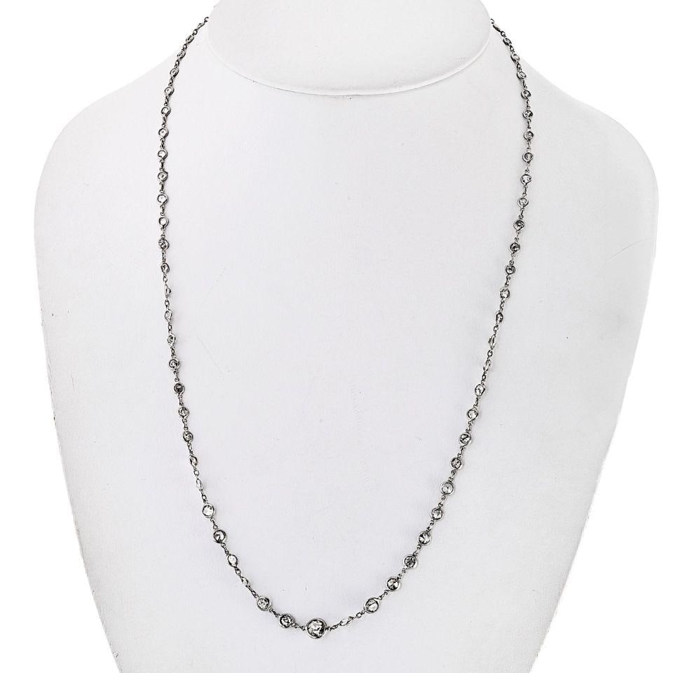 71 Diamond Platinum Necklace with 11.5 Carats by the Yard Design: 71 Diamond Platinum Necklace with 11.5 Carats by the Yard Design This pre-owned Diamonds by the Yard necklace features 71 diamonds set in platinum. The necklace has a total approximate diamond weight