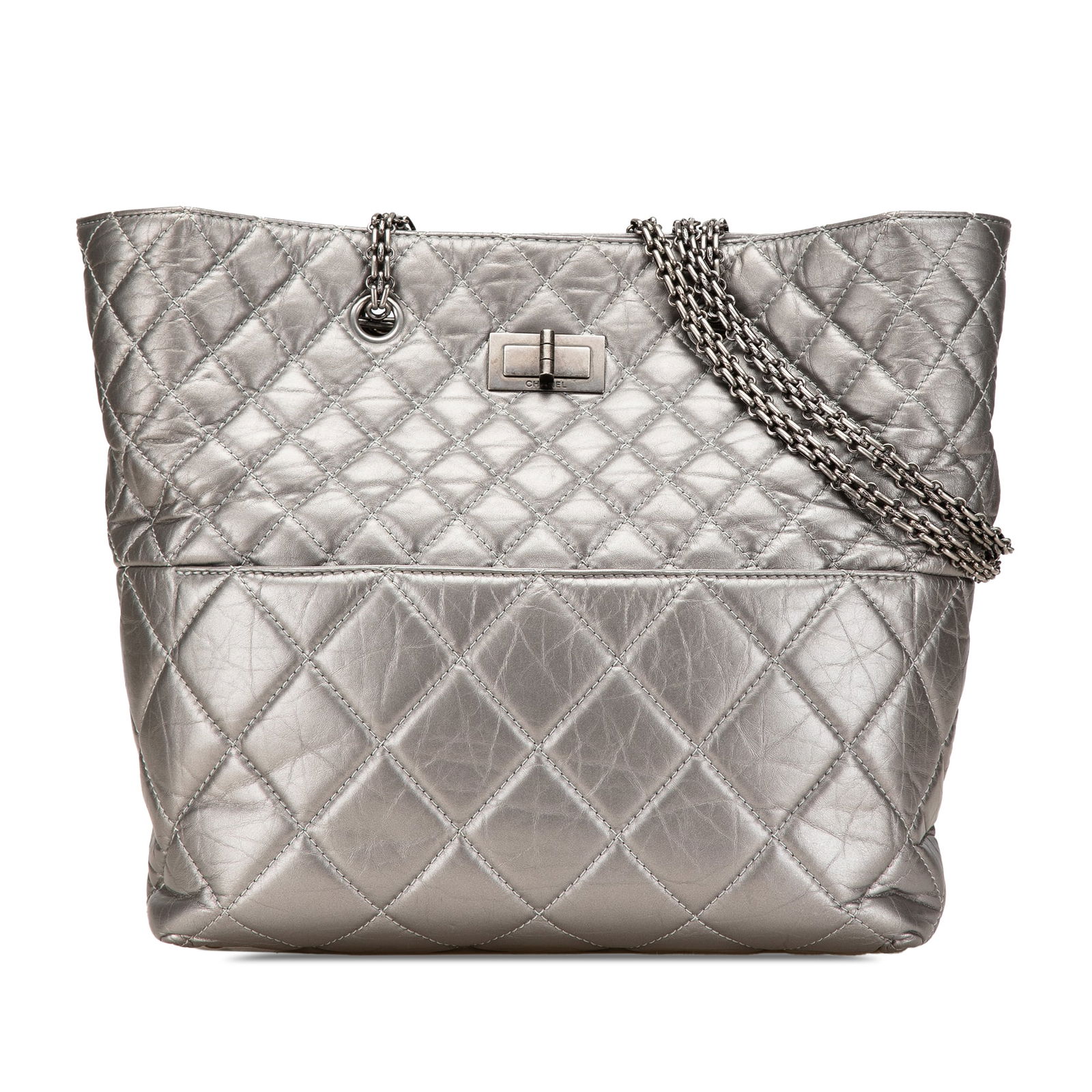 Chanel Reissue 2.55 Quilted Silver Aged Calfskin Tote Bag: Chanel Reissue 2.55 Quilted Silver Aged Calfskin Tote Bag This Chanel Reissue 2.55 Quilted Tote is crafted from aged calfskin leather, showcasing a luxurious silver hue. The bag features chain link sh