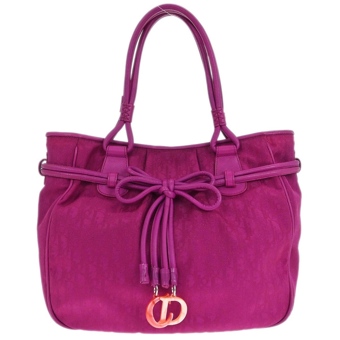 Dior Trotter Medium Nylon and Leather Tote Bag in Purple: Dior Trotter Medium Nylon and Leather Tote Bag in Purple This Christian Dior Trotter tote handbag features a distinctive purple nylon exterior accented with leather details. Designed in a medium size,