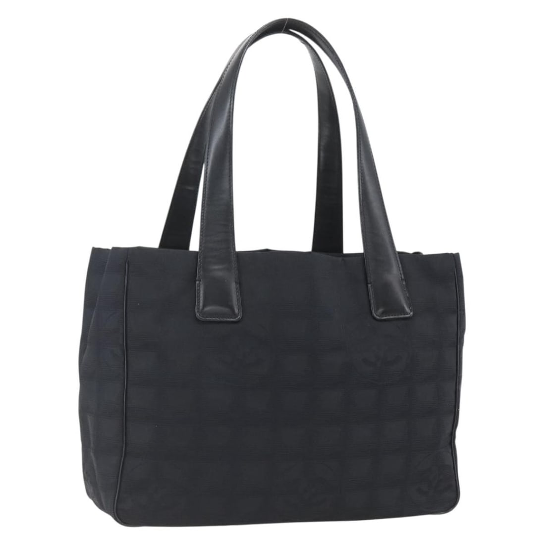 Chanel New Travel Line Black Nylon Tote with Gold CC Emblem: Chanel New Travel Line Black Nylon Tote with Gold CC Emblem This CHANEL Travel Line tote bag features a black and gold nylon exterior with CHANEL's signature CC motif. Designed with practicality in mi