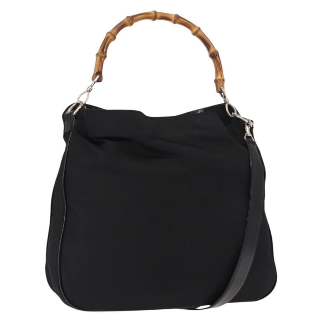 Gucci Black Nylon Vintage Handbag with Bamboo Handles: Gucci Black Nylon Vintage Handbag with Bamboo Handles This pre-owned Gucci Vintage Bamboo Handle Bag features a black nylon exterior and iconic bamboo handles. Designed for women, the bag includes bot