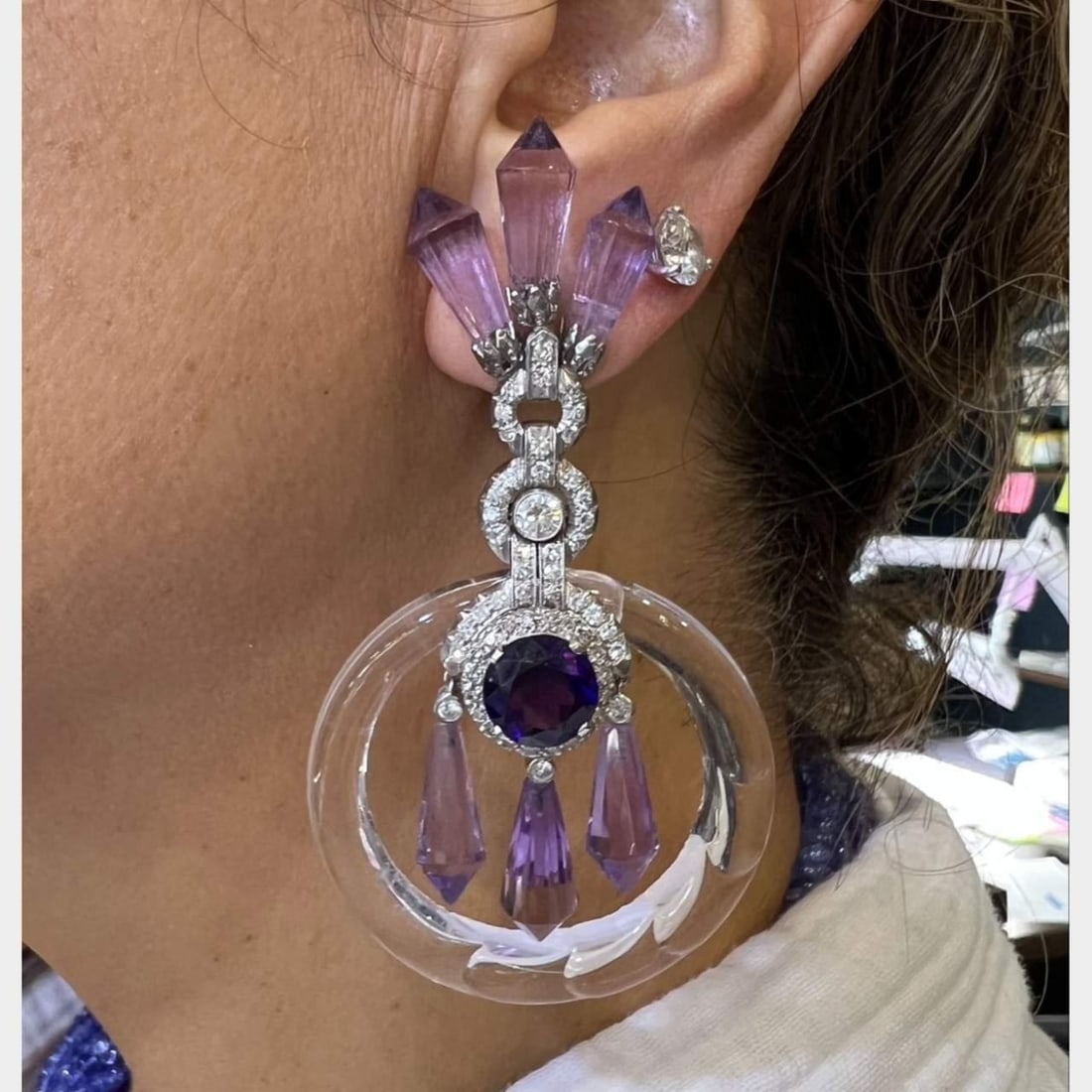 Art Deco Platinum Earrings with 112 Diamonds and Amethyst: Art Deco Platinum Earrings with 112 Diamonds and Amethyst These exquisite Art Deco earrings are crafted from platinum and feature a stunning combination of amethyst and diamonds. The earrings weigh 46