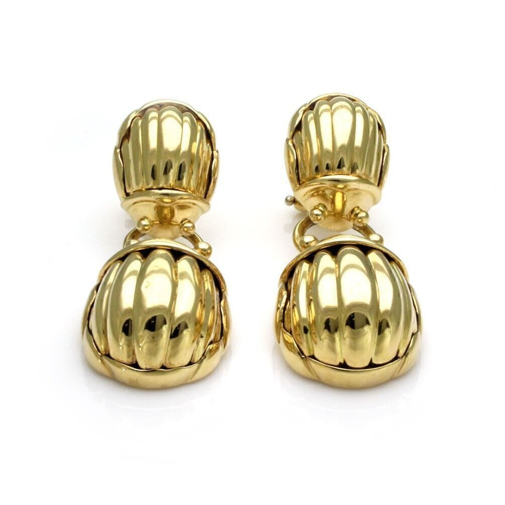 18k Gold Scarab Beetle Dangle Earrings by Tiffany & Co. Pair: 18k Gold Scarab Beetle Dangle Earrings by Tiffany & Co. Pair These vintage Tiffany & Co. dangle earrings feature two intricately crafted scarab beetle charms in 18k yellow gold. Signed and hallmarked