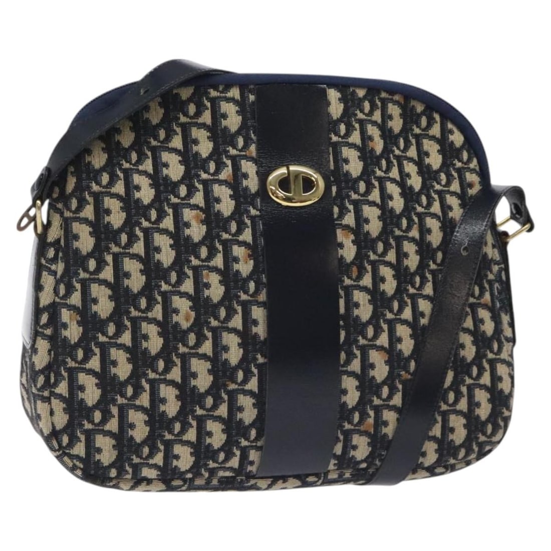 Christian Dior Canvas Navy Shoulder Bag Vintage Trotter Model: Christian Dior Canvas Navy Shoulder Bag Vintage Trotter Model This Christian Dior Vintage Trotter shoulder bag for women features a navy canvas exterior with leather and metal fittings. It shows signs
