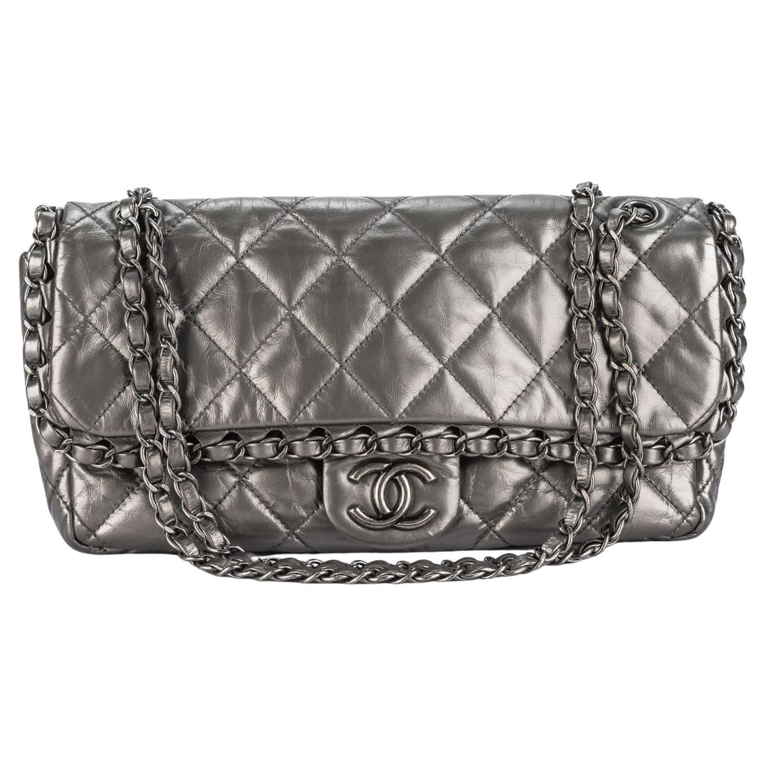 Chanel Platinum Chain Me Flap Bag Gray Metallic Leather: Chanel Platinum Chain Me Flap Bag Gray Metallic Leather Introducing the Chanel Platinum Chain Me Flap Bag, a luxurious accessory crafted from quilted matte gray metallic calfskin leather. This exquisi