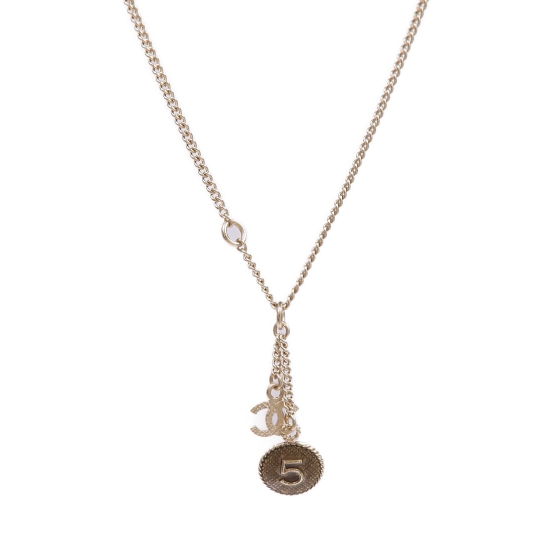 Gold Tone Necklace with CC Logo by Chanel: Gold Tone Necklace with CC Logo by Chanel This CHANEL necklace features the signature CC logo design in a gold-toned metal. Crafted in France, it is a stylish accessory that adds an elegant touch to