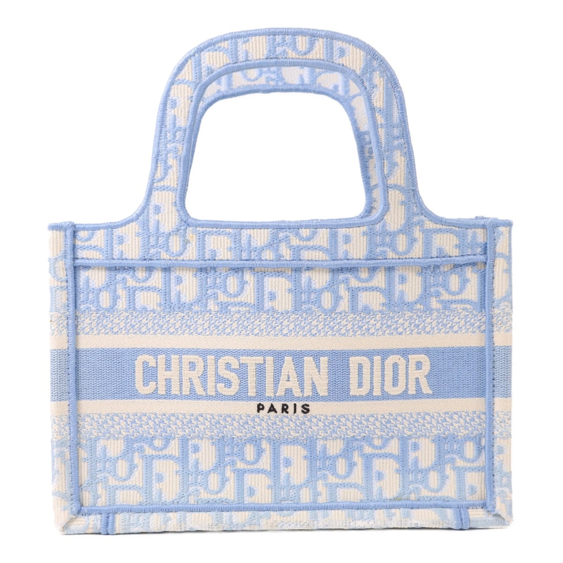 Dior Book Tote Micro Canvas Bag in Light Blue S5475ZRIW-917U: Dior Book Tote Micro Canvas Bag in Light Blue S5475ZRIW-917U This Christian Dior Book Tote Micro Tote Bag features a light blue canvas exterior and is designed in a compact silhouette. Crafted in Fran