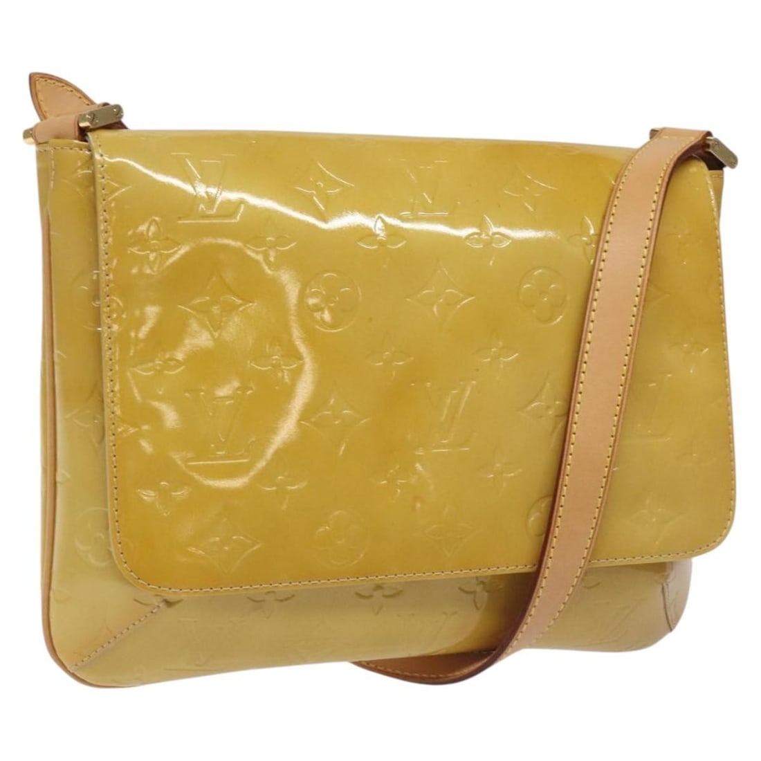 Thompson Street Beige Patent Leather Shoulder Bag by Louis Vuitton: Thompson Street Beige Patent Leather Shoulder Bag by Louis Vuitton This Louis Vuitton Thompson Street handbag features the iconic Monogram Vernis design in beige patent leather. Designed for women, it