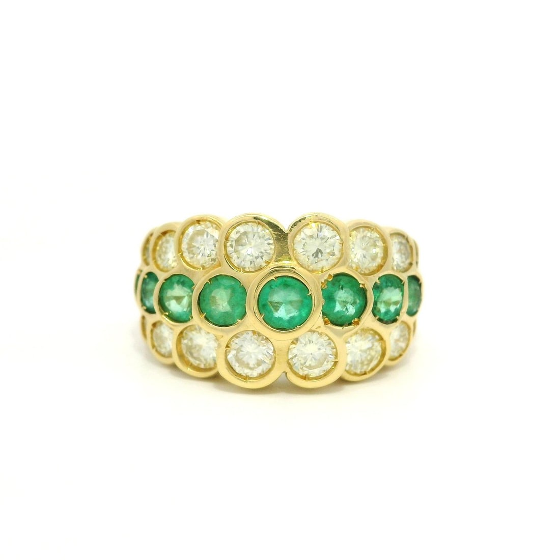 18k Yellow Gold 3.26ct Emerald Diamond Pyramid Band Ring: 18k Yellow Gold 3.26ct Emerald Diamond Pyramid Band Ring This stunning 18k yellow gold band ring showcases a striking pyramid style design, featuring three rows adorned with natural emeralds and diamo