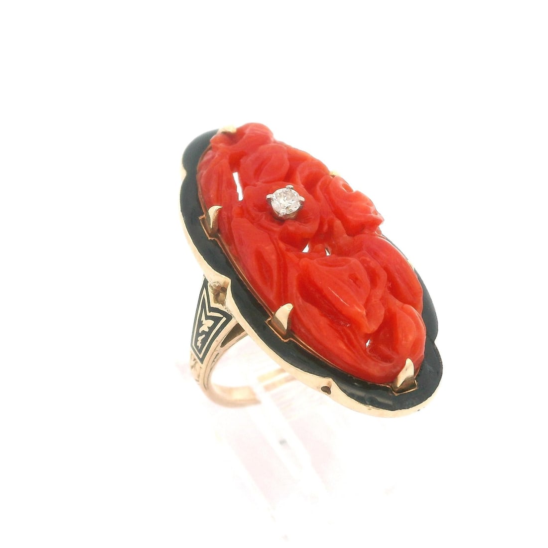 Vintage 14k Gold GIA Coral Diamond Black Enamel Cocktail Ring: Vintage 14k Gold GIA Coral Diamond Black Enamel Cocktail Ring This exquisite vintage cocktail ring features a stunning carved coral centerpiece, certified by GIA, showcasing a deep orangy-red hue. The