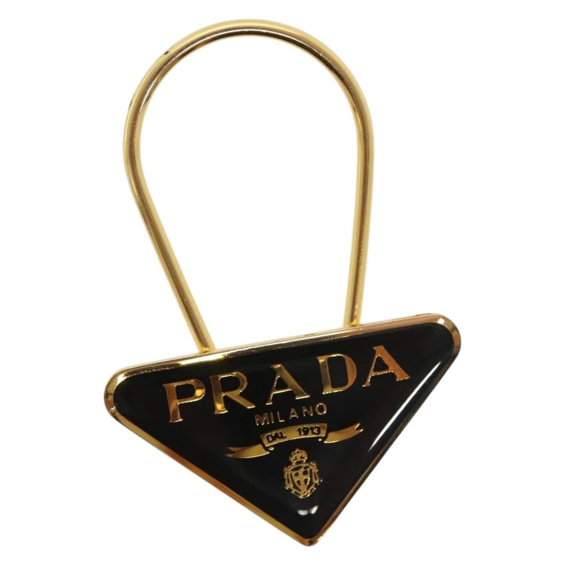 PRADA Black Gold Metal Key Ring Authentic AC3873: PRADA Black Gold Metal Key Ring Authentic AC3873 This PRADA key ring showcases a sleek design, crafted from durable metal with a striking black and gold color combination. Measuring approximately 2.0