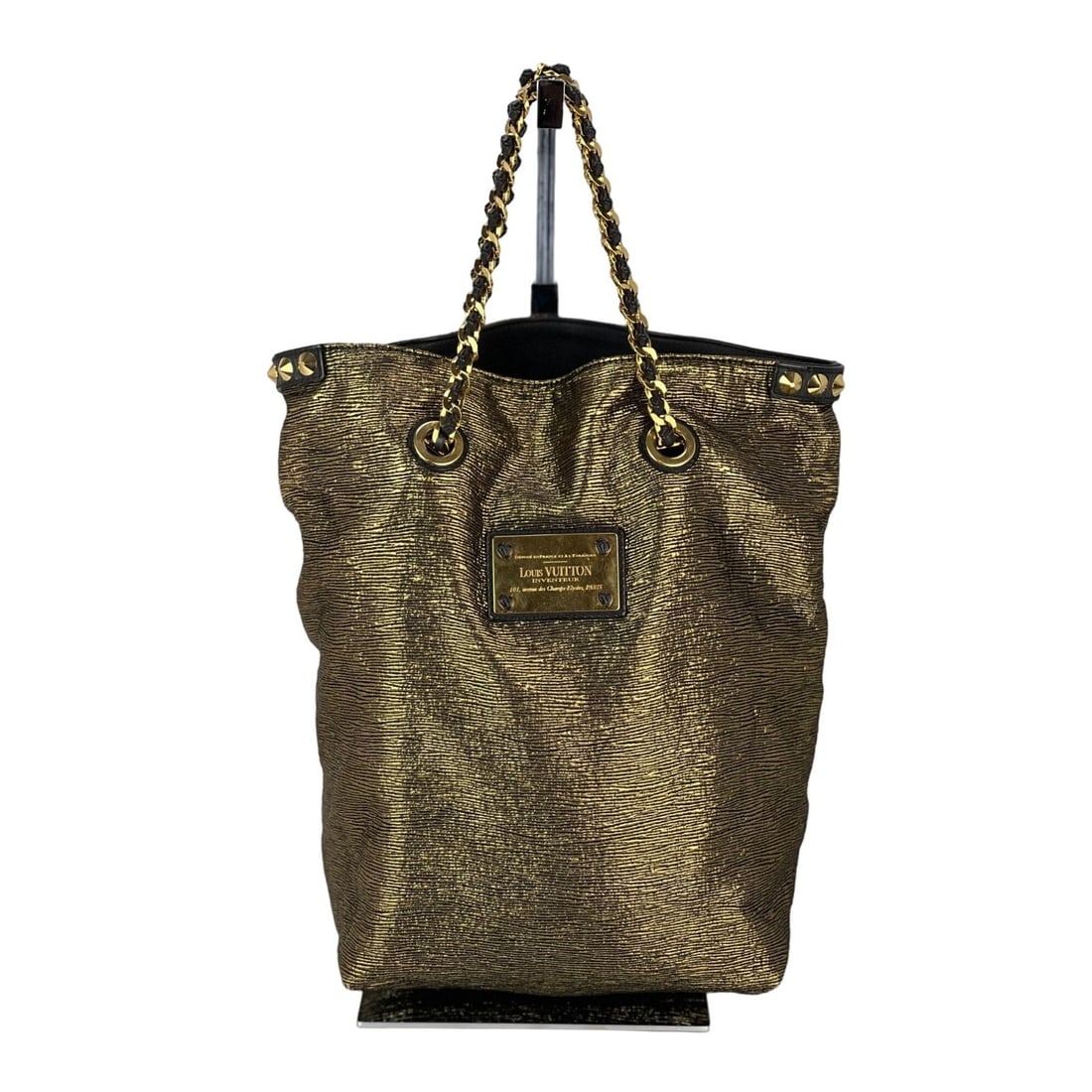 Louis Vuitton Metallic Jacquard Double Jeu Gold Tote with Chain Strap: Louis Vuitton Metallic Jacquard Double Jeu Gold Tote with Chain Strap Elevate your style with the Louis Vuitton Metallic Jacquard Double Jeu Soft Gold Tote. This exquisite bag features a stunning gold