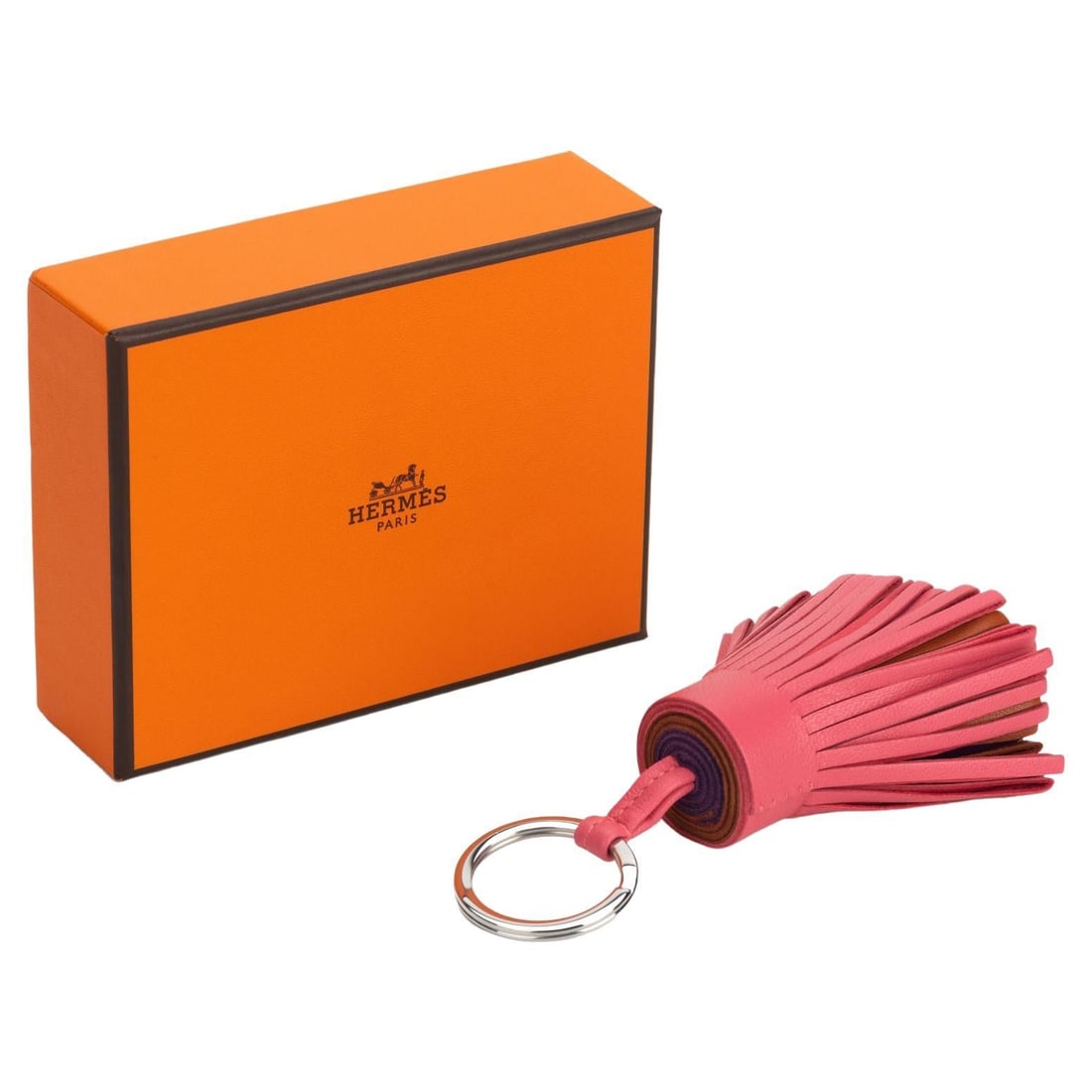 Hermes Carmen Key Ring Lambskin Rose Pourpre Stainless Steel: Hermes Carmen Key Ring Lambskin Rose Pourpre Stainless Steel Introducing the Hermes Carmen Key Ring in a stunning Rose Pourpre hue, crafted from luxurious lambskin leather. This elegant accessory feat